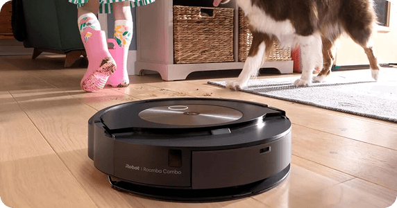 iRobot Vacuum with pet and child in background